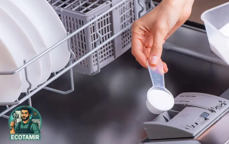 فردی در حال ریختن نمک به داخل ماشین ظرفشویی